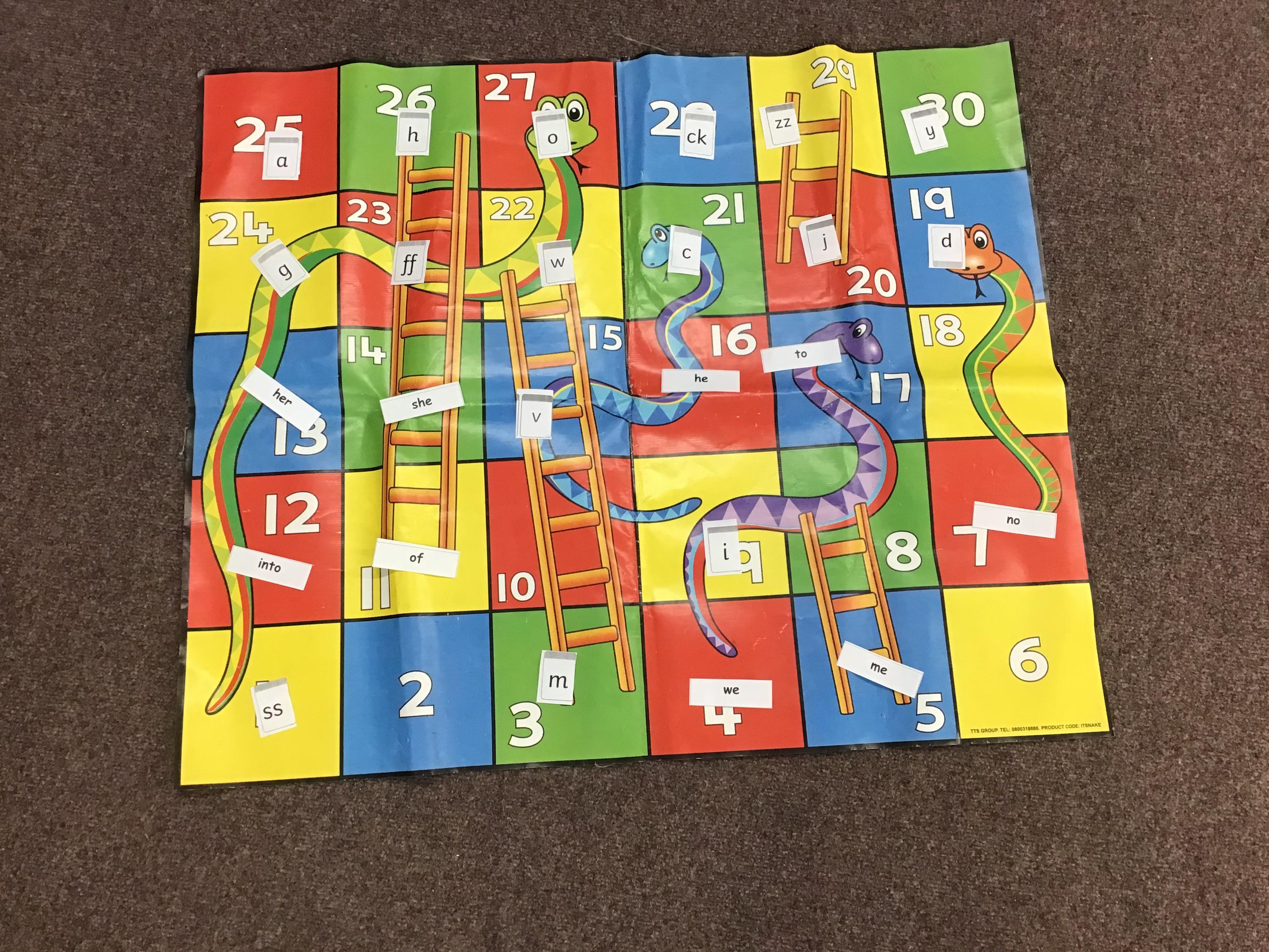 Add the sounds or tricky words to your favourite board games.